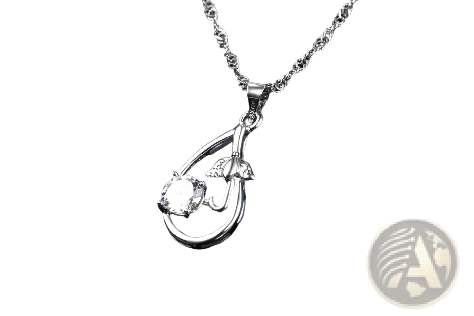 Silver bridal necklace with teardrop pendant featuring a clear gemstone and delicate floral sterling silver detailing