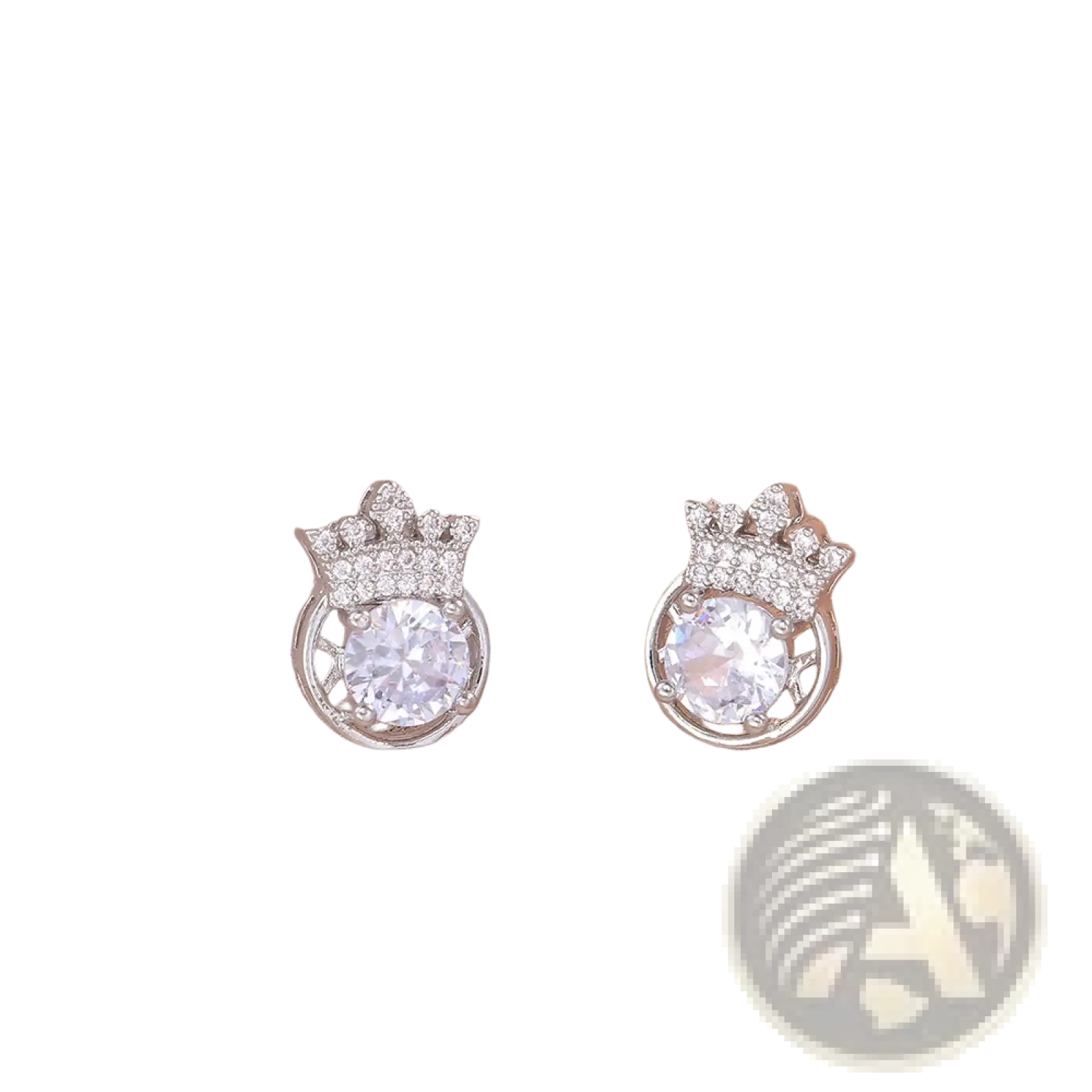 Silver crown-shaped earrings with a central clear zircon gemstone surrounded by smaller sparkling stones in a jewelry set