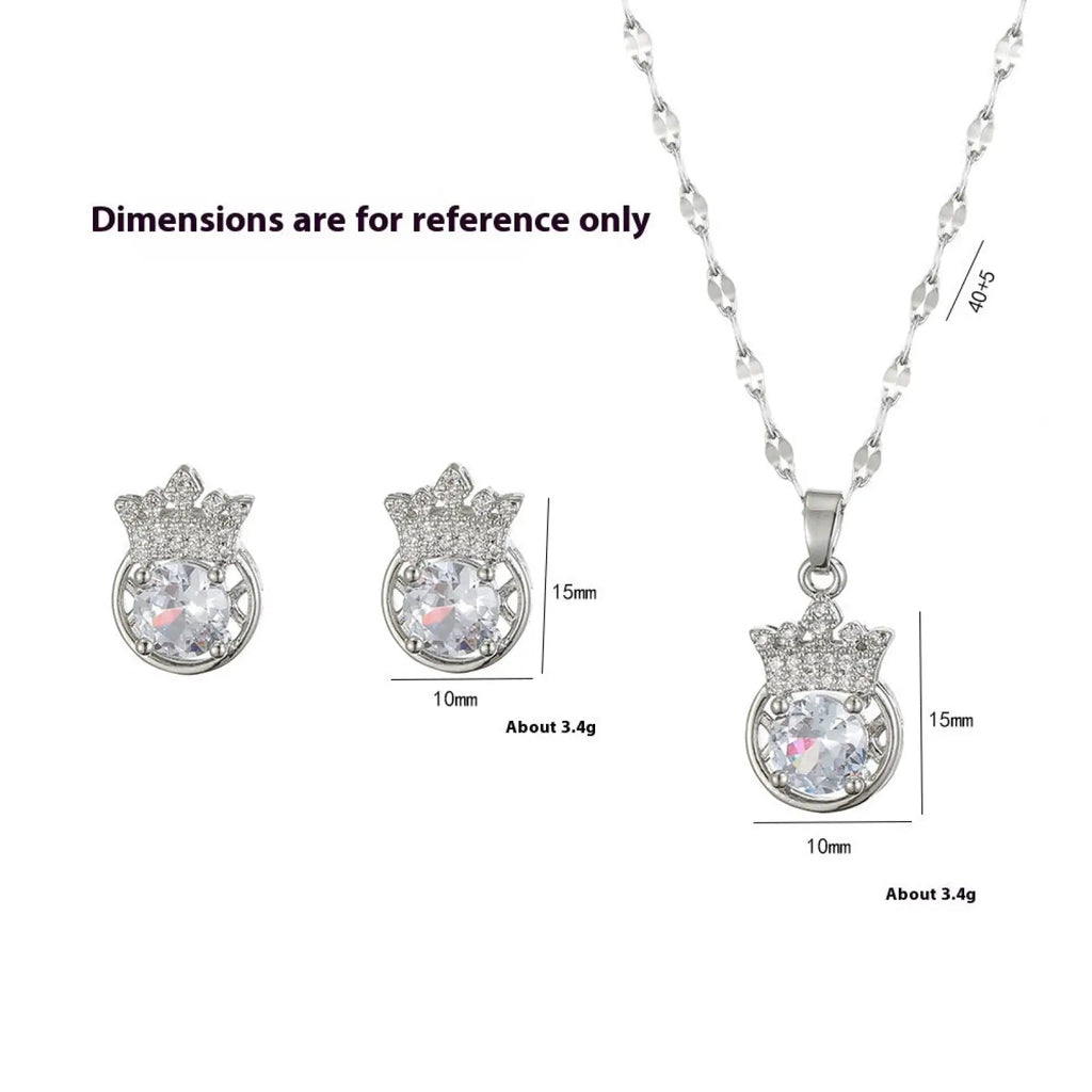 Silver crown zircon necklace and earring set featuring a silver pendant with clear central gemstone and surrounding crystals