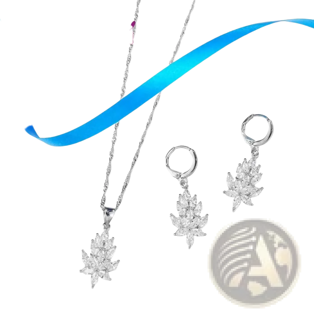 Silver crystal leaf jewelry set by yameli featuring silver leaf-shaped pendant necklace and matching earrings with clear crystals