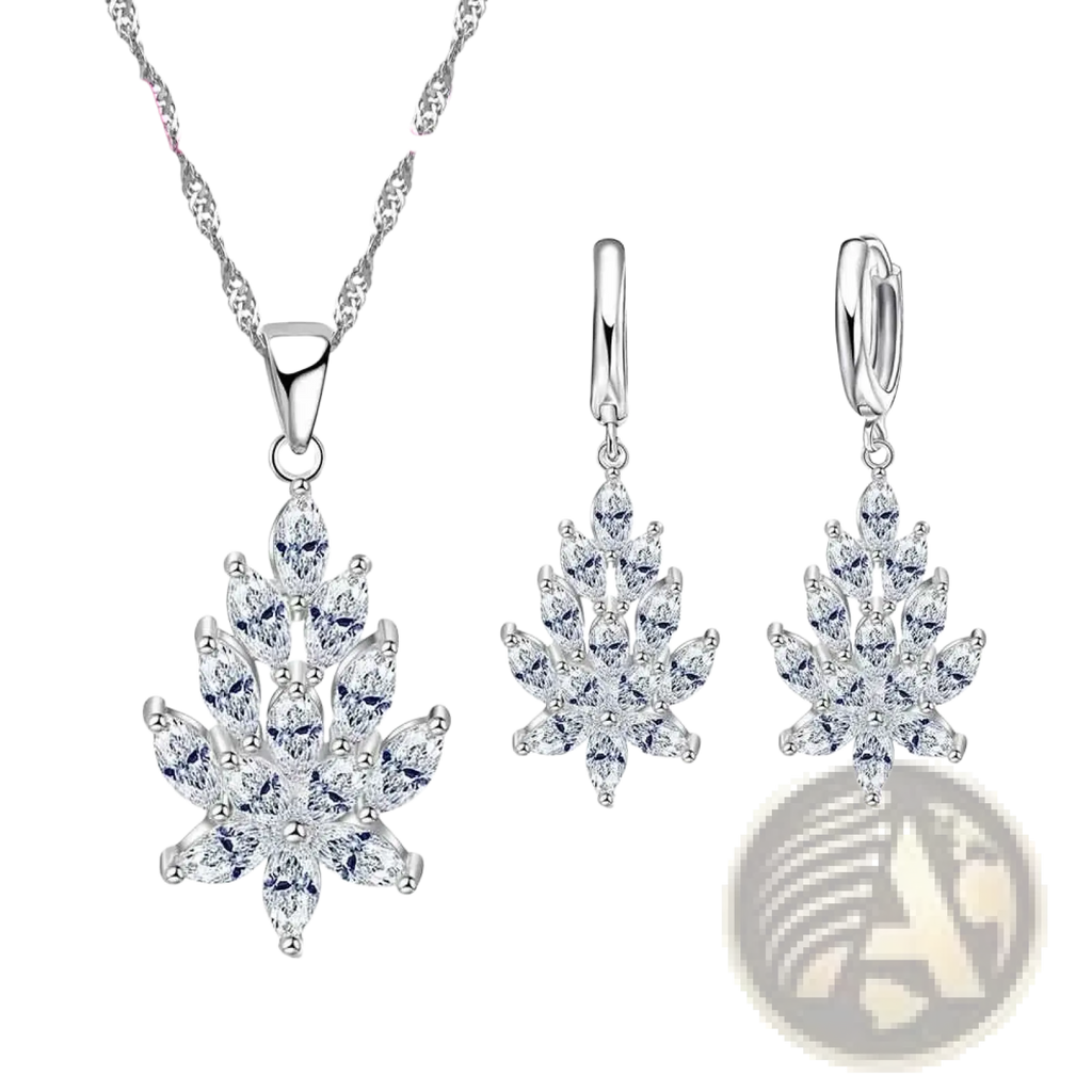 Silver crystal leaf jewelry set featuring silver leaf-shaped pendant necklace and matching earrings with clear crystals