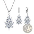 Silver crystal leaf jewelry set featuring silver leaf-shaped pendant necklace and matching earrings with clear crystals