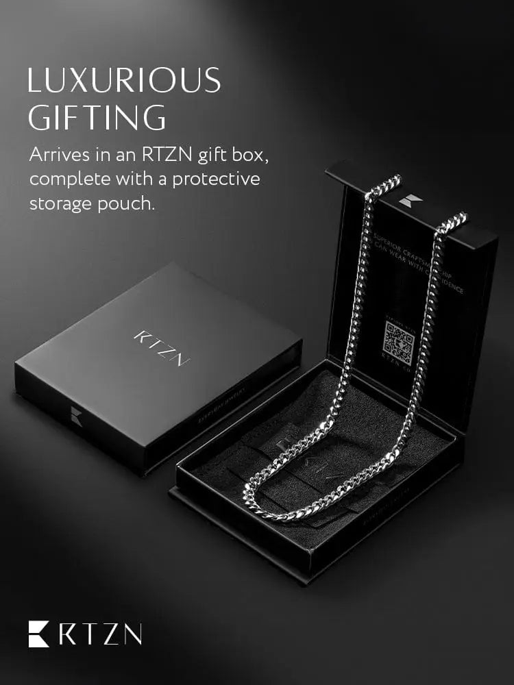 5mm silver diamond cut Cuban link chain necklace in silver tone displayed in a sleek black rtzn gift box