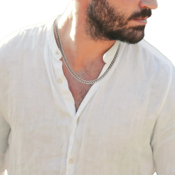Silver-toned curb chain necklace for men showcasing a silver cuban link chain worn around the neck
