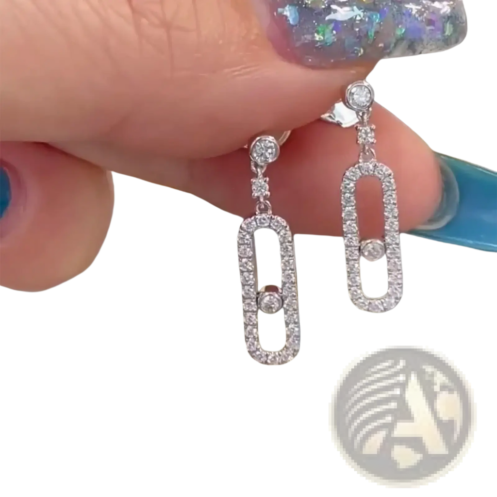 Elegant silver diamond rectangle drop earrings with an open-frame design and central sparkling diamond accent