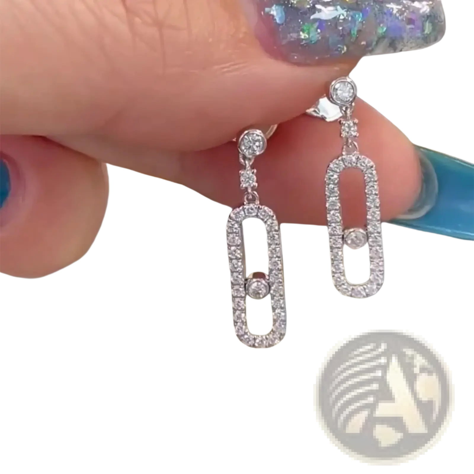 Elegant silver diamond rectangle drop earrings with an open-frame design and central sparkling diamond accent