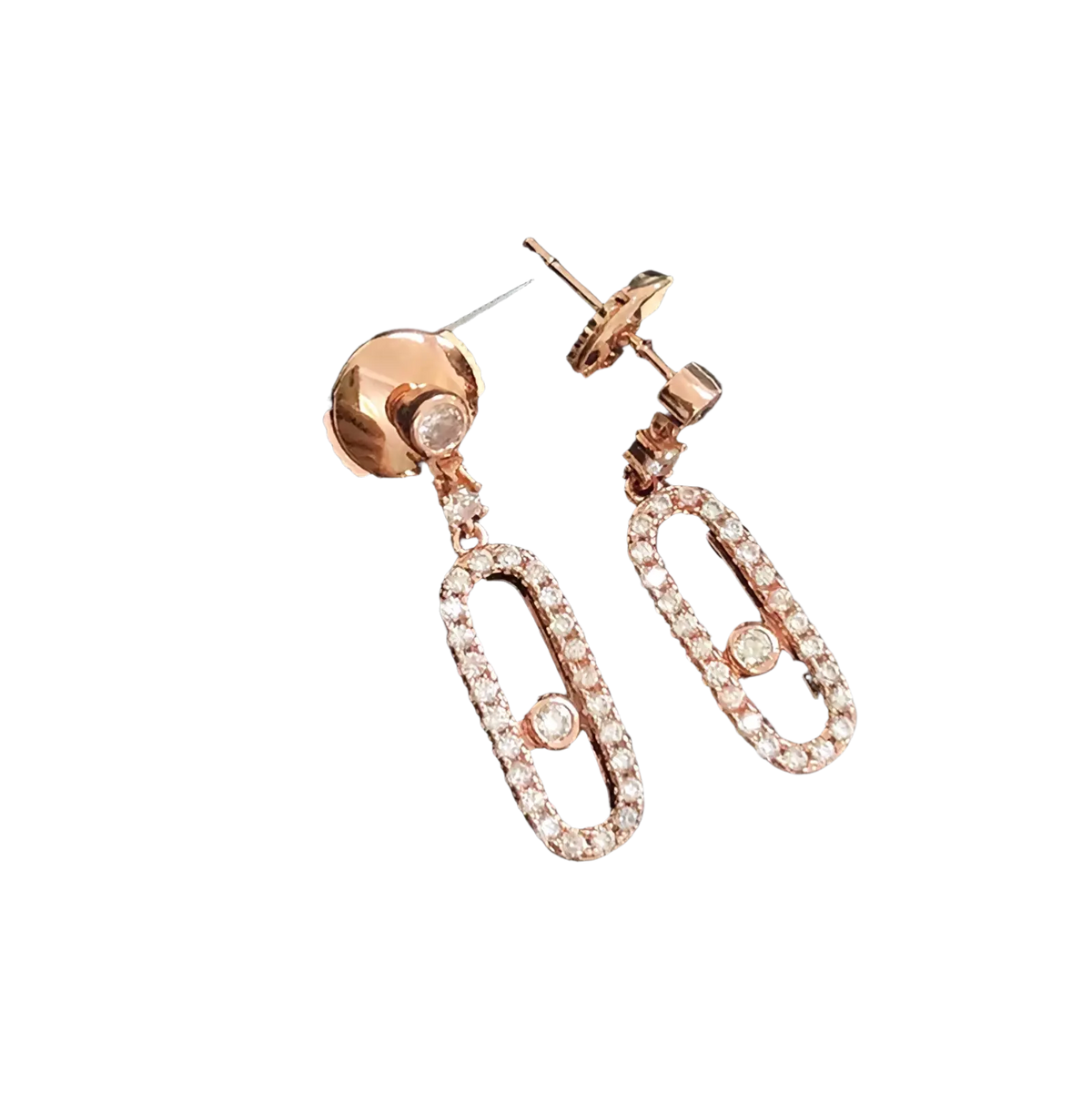 Rose gold drop earrings with oval diamond accents and a central diamond detail in a silver diamond rectangle style