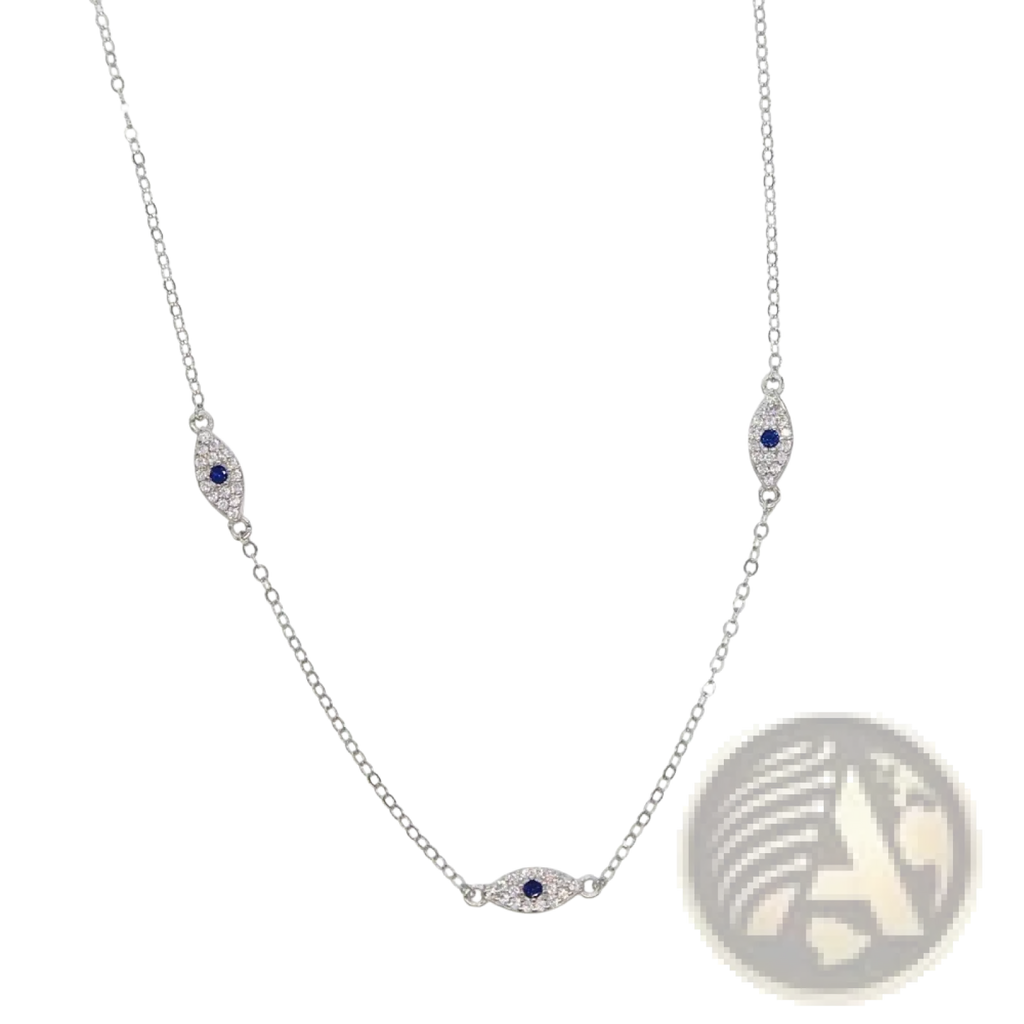 Silver evil eye charm necklace featuring a delicate silver chain with three blue sapphire and cz crystal pendants