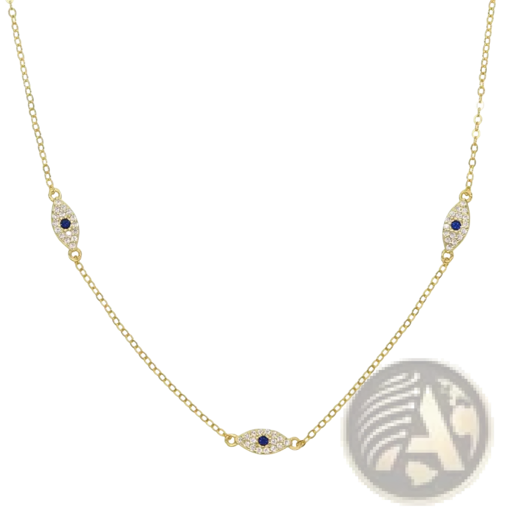 Gold-toned silver evil eye charm necklace with three eye-shaped pendants featuring blue gemstones and clear crystals