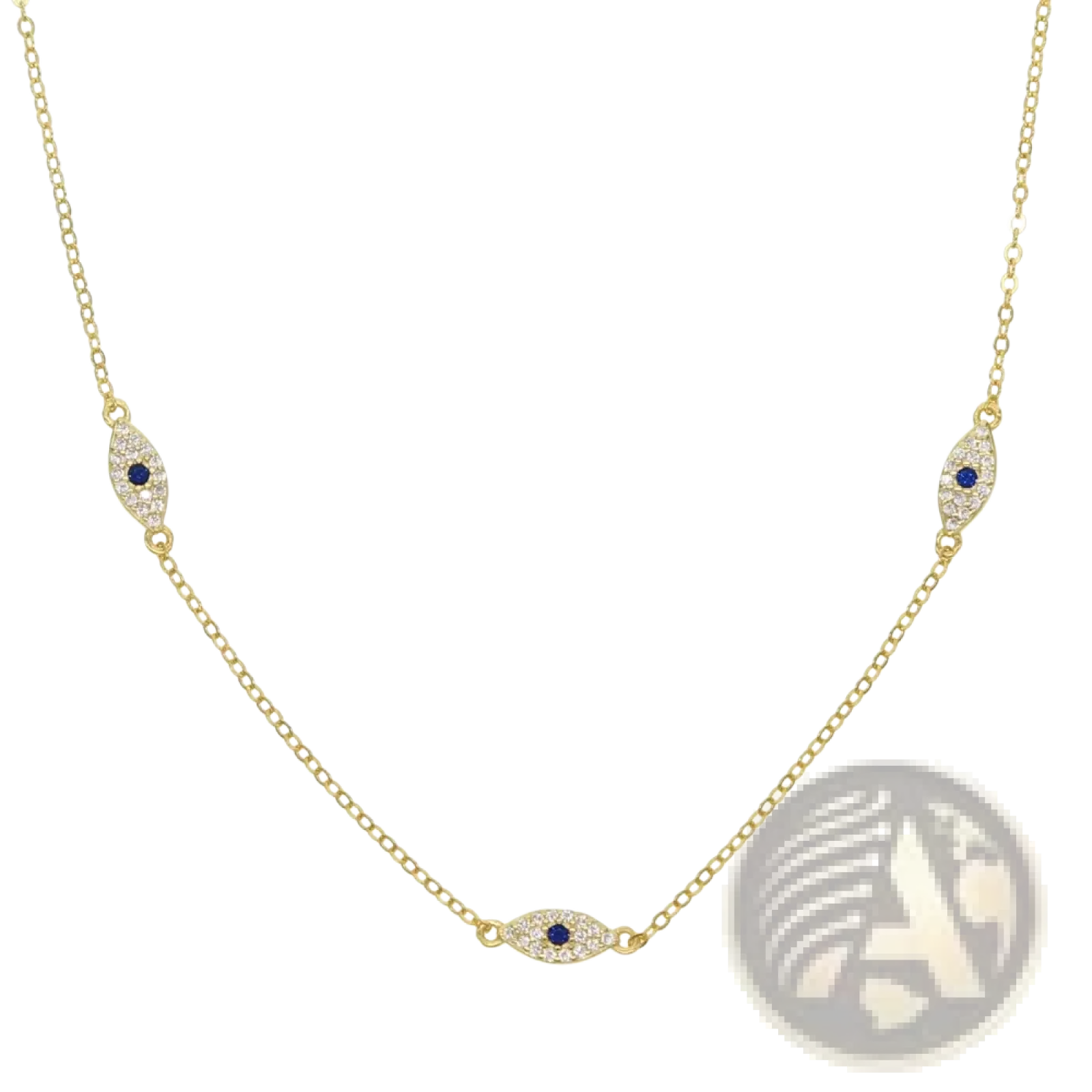 Gold-toned silver evil eye charm necklace with three eye-shaped pendants featuring blue gemstones and clear crystals