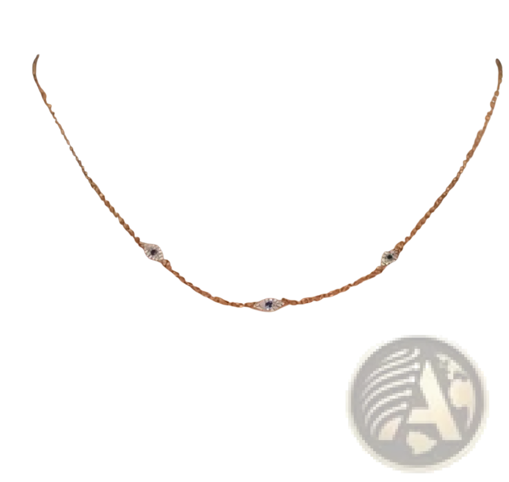 A delicate silver chain necklace with three small sparkling cz crystal evil eye charms in gold accents
