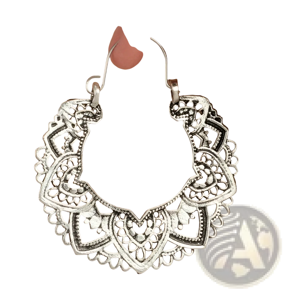 Silver filigree mandala crescent hoop earrings featuring intricate filigree detailing and delicate design