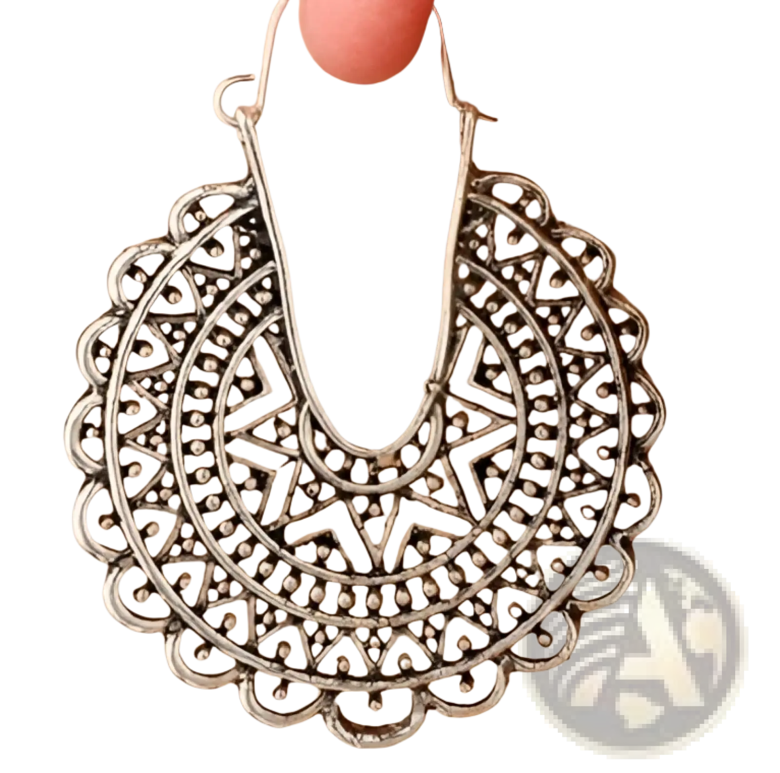 Silver filigree mandala crescent hoop earrings with intricate geometric patterns and delicate scalloped edges