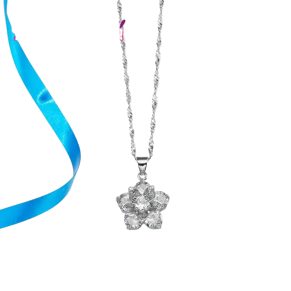 Silver floral cz bridal jewelry set featuring a silver chain necklace with a delicate flower pendant adorned with clear stones