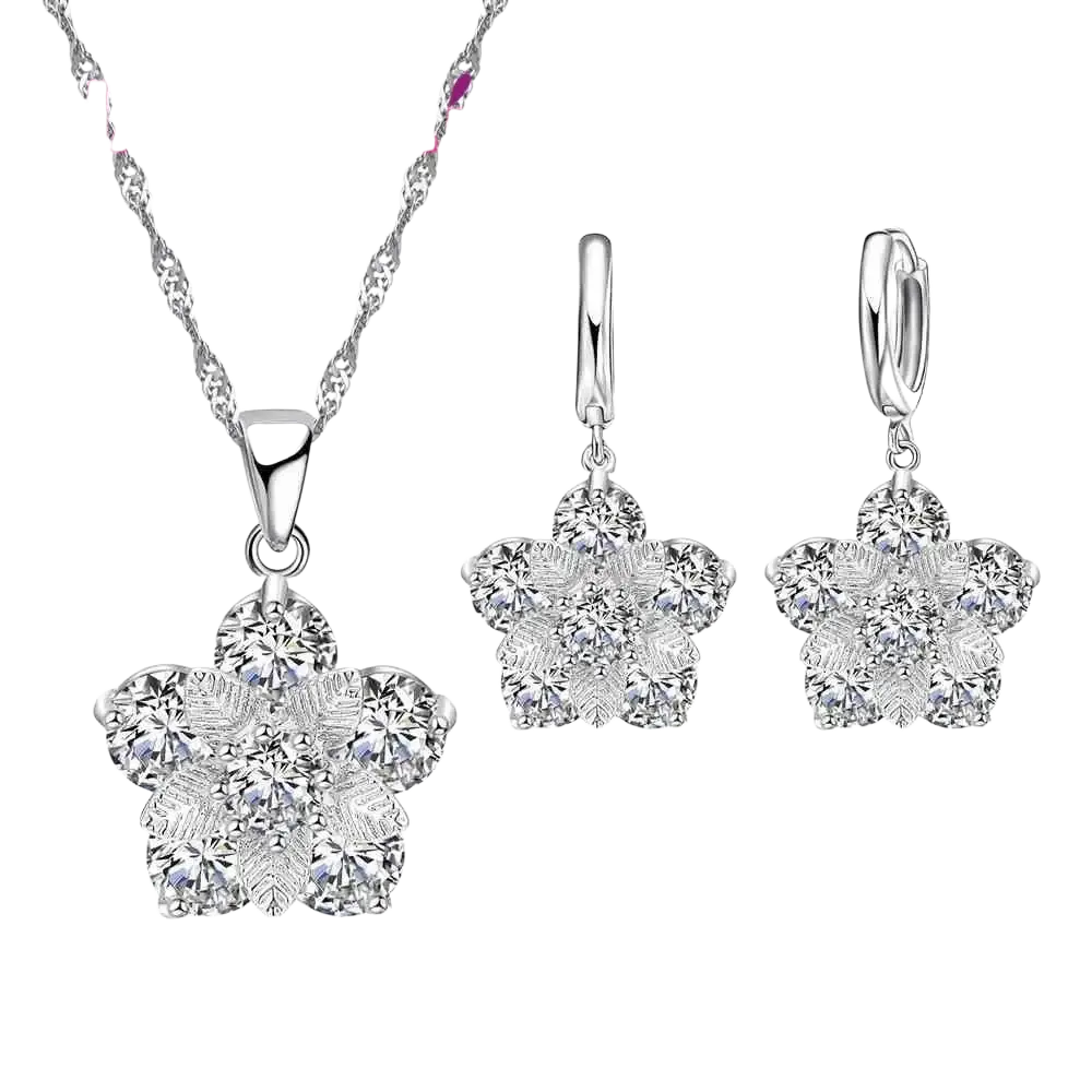 Silver floral cz bridal jewelry set featuring a silver pendant necklace and matching earrings with clear stones