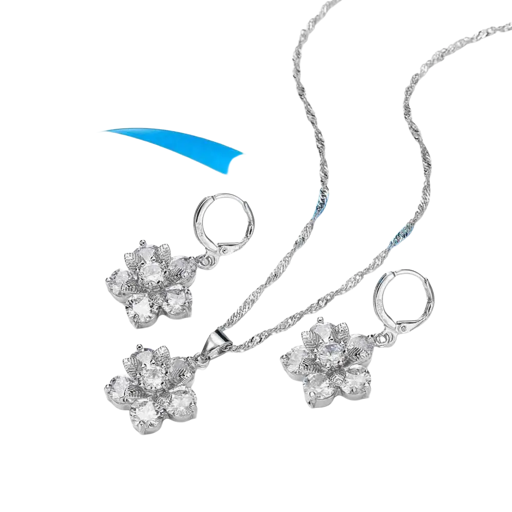 Silver floral cz bridal jewelry set by yameli featuring silver pendant necklace and matching earrings with clear crystals