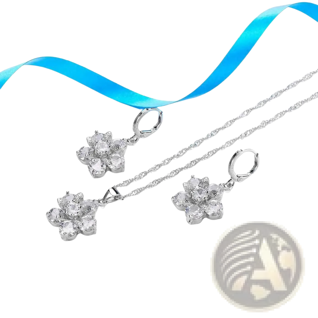 Silver floral cz bridal jewelry set featuring silver pendant necklace and matching earrings with clear crystal stones