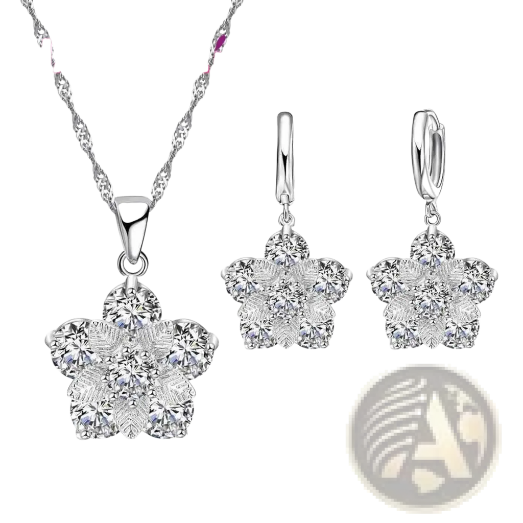 Silver floral cz bridal jewelry set featuring a silver pendant necklace and matching earrings with clear stones