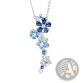 Silver flower zircon necklace bracelet set featuring a delicate silver necklace with cascading blue and clear gemstones