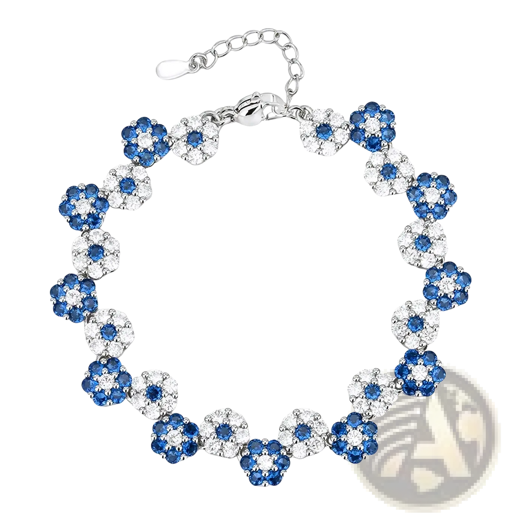 A delicate silver bracelet with alternating blue and clear gemstone flower clusters from the silver flower zircon set
