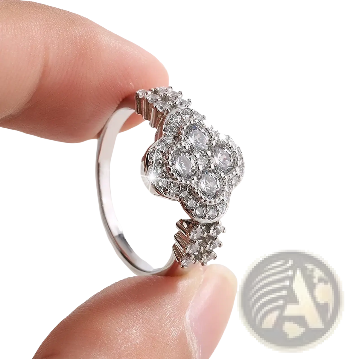 A sparkling silver four leaf clover diamond ring with a floral design and multiple clear crystals in a layered pattern