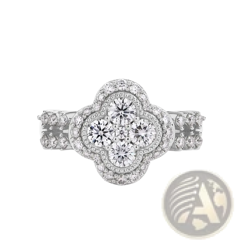 Silver four leaf clover diamond ring featuring a white gold quatrefoil design with five central stones and smaller diamonds
