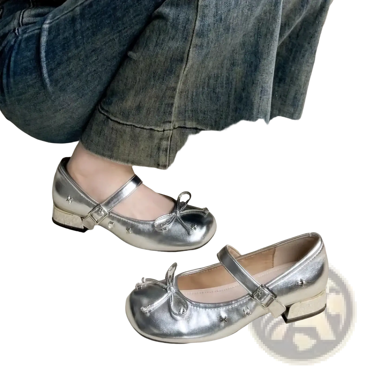 Silver mary jane flats featuring metallic material with bow and star embellishments for stylish wear