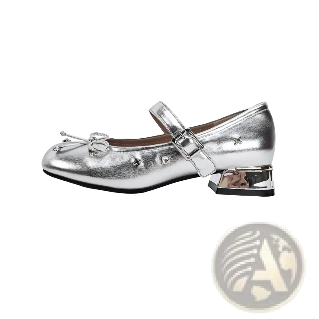 Silver metallic mary jane flats with buckle strap, decorative bow at toe, and chunky block heel
