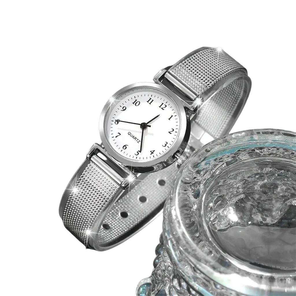 Silver mesh women quartz watch with simple white dial black hands and silver arabic numerals