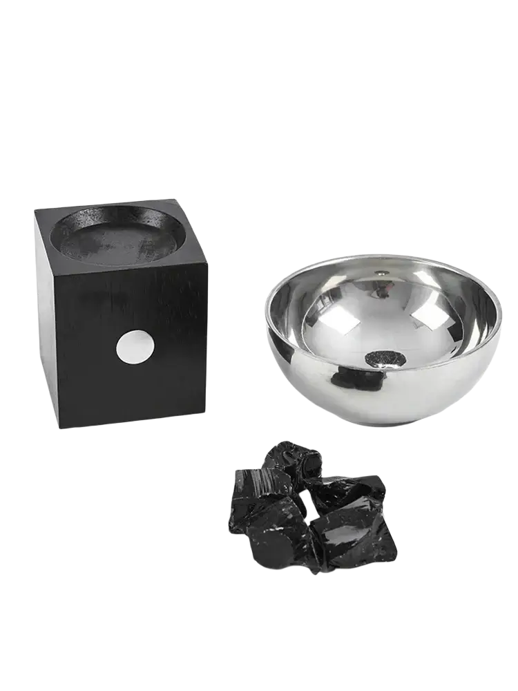 Shiny silver metallic aromatherapy bowl with black base made of metal for essential oil use