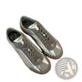 Silver metallic leather casual low-top sneakers with gray suede accents and gum rubber sole for everyday wear