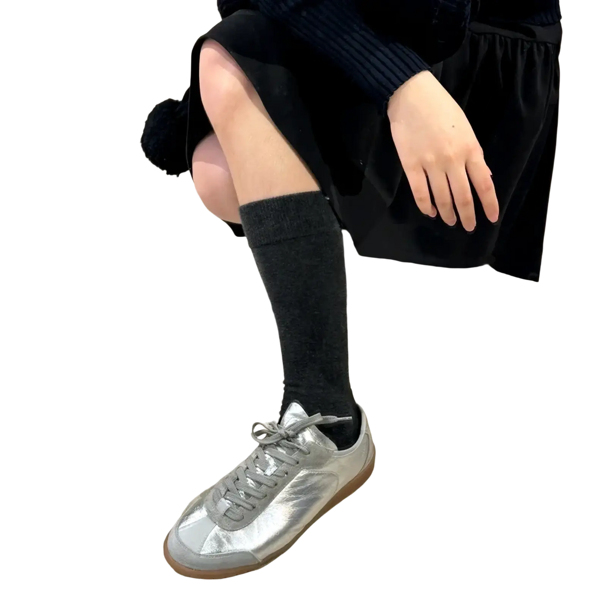Silver metallic leather casual low-top sneaker with gray laces and tan rubber sole for everyday wear