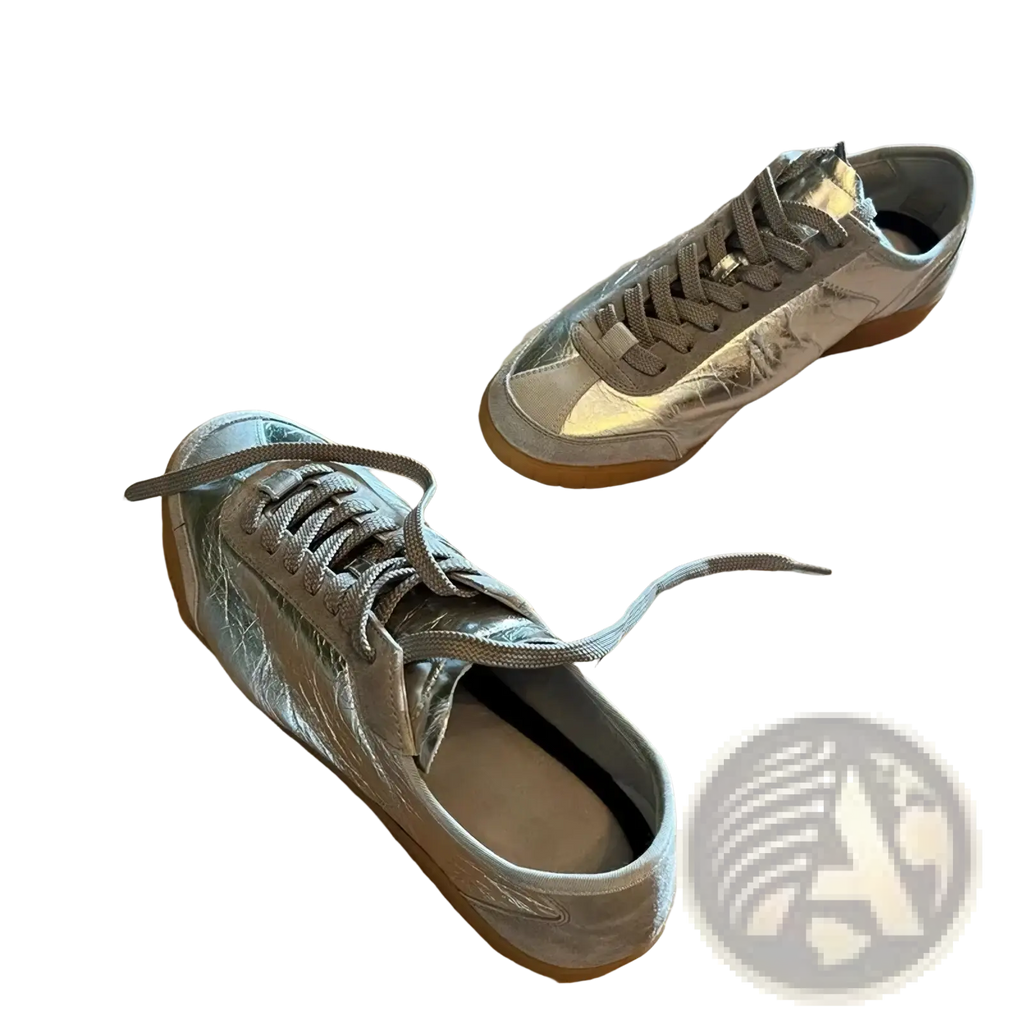 Silver metallic leather casual sneakers with shiny textured crinkled leather upper and matching laces