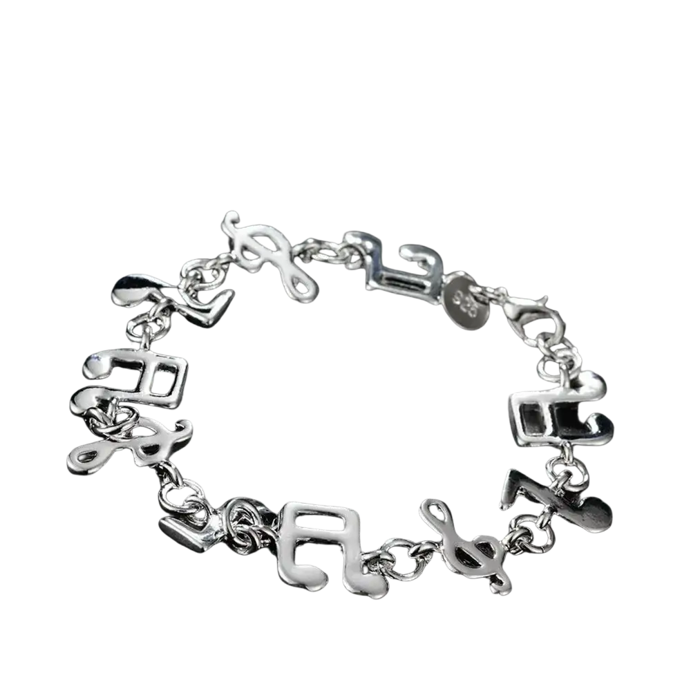 Silver musical note sterling silver bracelet with polished reflective charms and intricate detailing on 925 silver