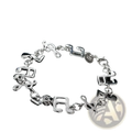 Silver musical note sterling silver bracelet with polished reflective charms and intricate detailing on 925 silver