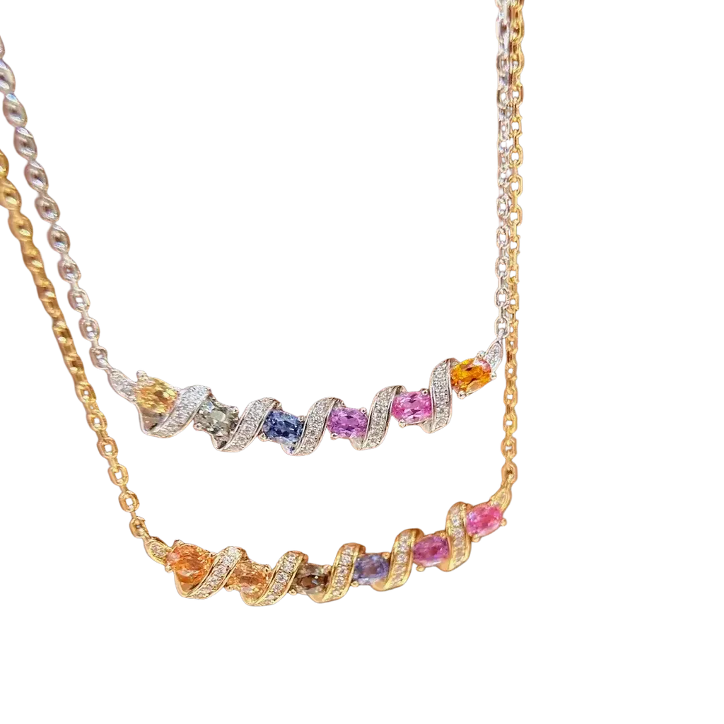 Silver necklace featuring a twisted bar pendant with multicolored oval-cut gemstones and diamond accents in gold-toned metal