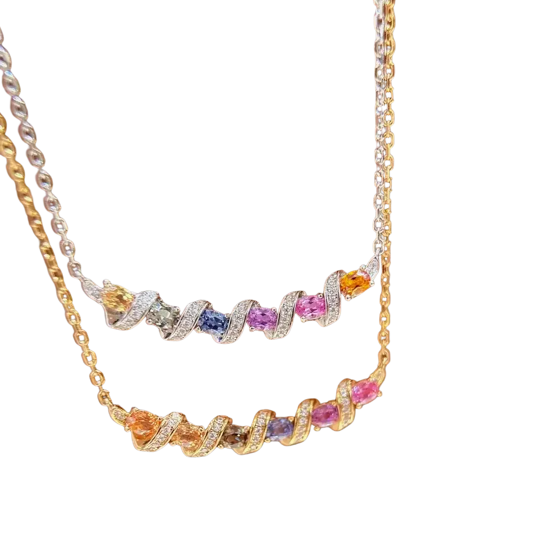 Silver necklace featuring a twisted bar pendant with multicolored oval-cut gemstones and diamond accents in gold-toned metal
