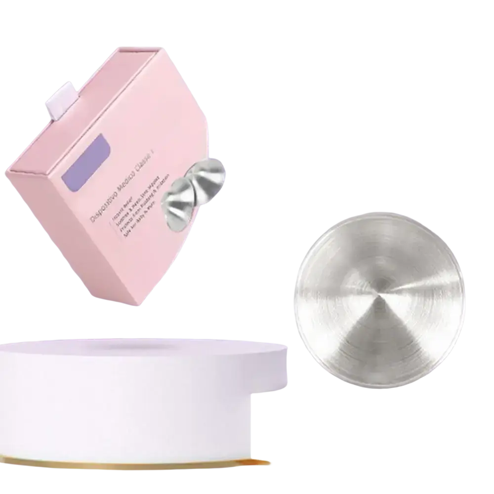 Silver metallic facial massage discs displayed in a pink box for breastfeeding healing nipple shields