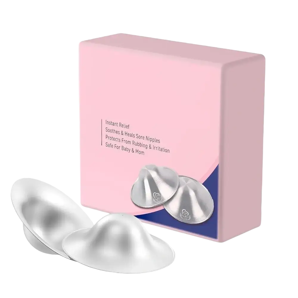 Silver metallic nursing pads with smooth rounded design and subtle embossed branding for breastfeeding healing