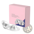 Silver metallic nursing pads with smooth rounded design and subtle embossed branding for breastfeeding healing
