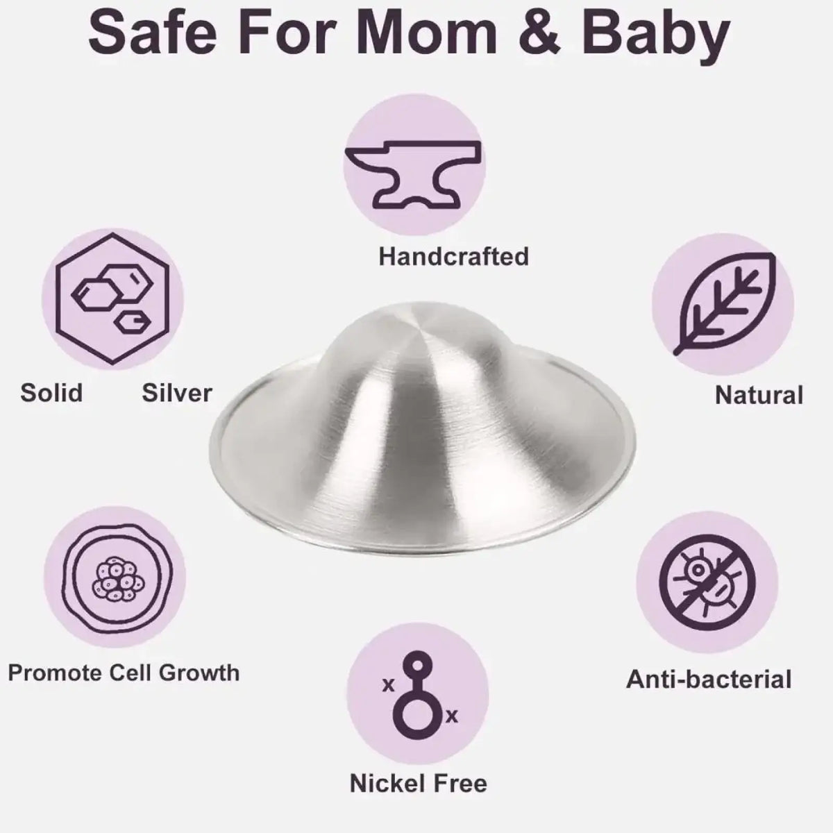 A sleek dome-shaped solid silver nipple shield with polished metallic finish for soothing breastfeeding soreness