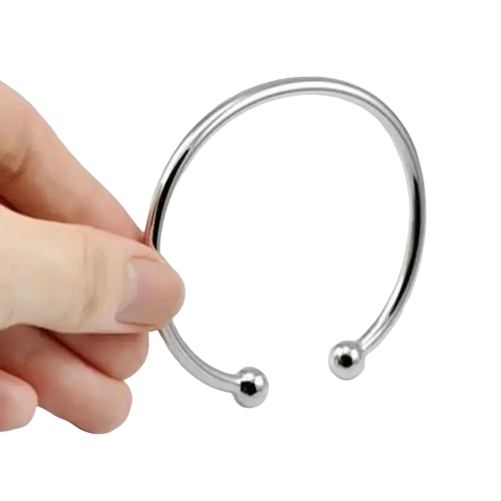 Silver plated adjustable open bangle bracelet with a sleek silver tone and polished spherical ends