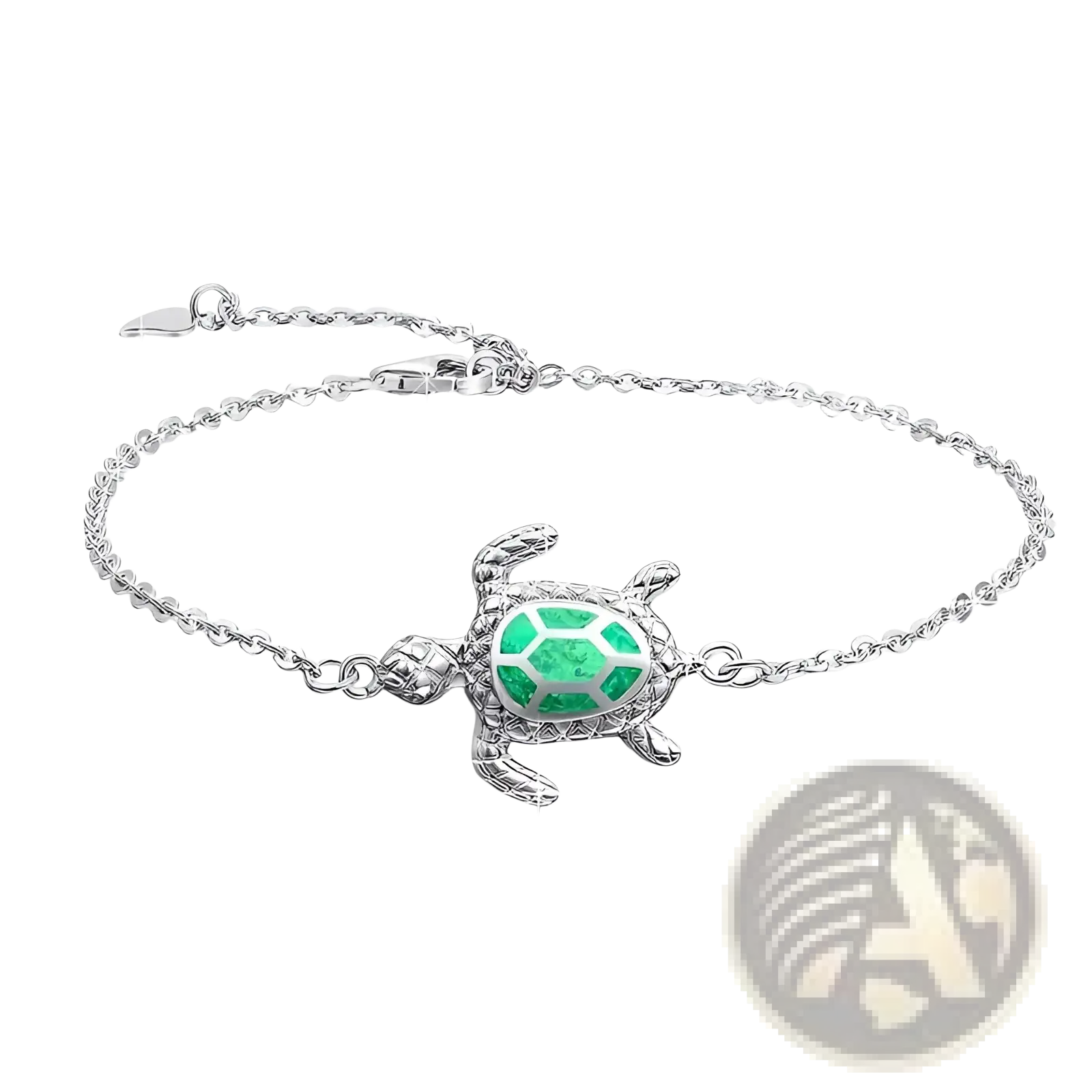 Silver sea turtle opal inlay anklet featuring a silver turtle charm with a green gemstone encrusted shell and delicate chain