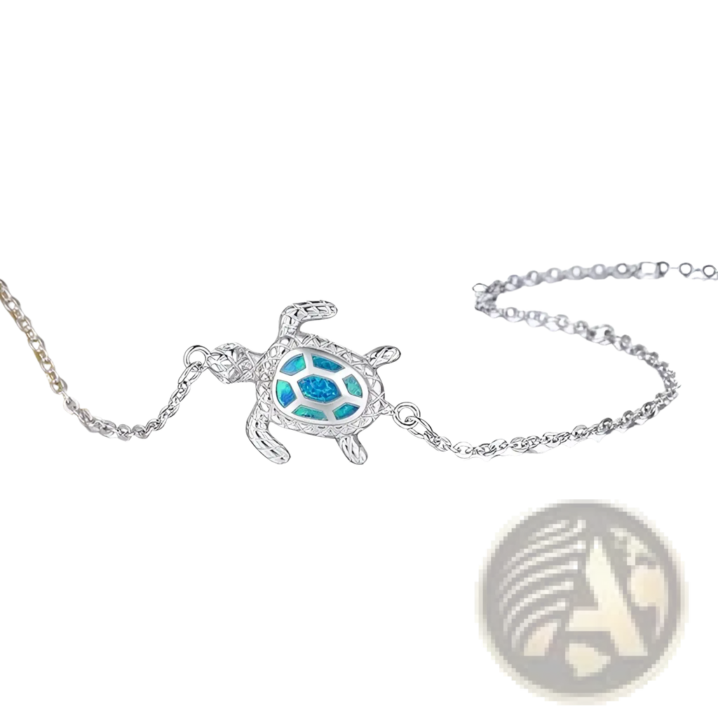 Silver sea turtle anklet with blue opal inlay and delicate silver chain for elegant beachwear accessory