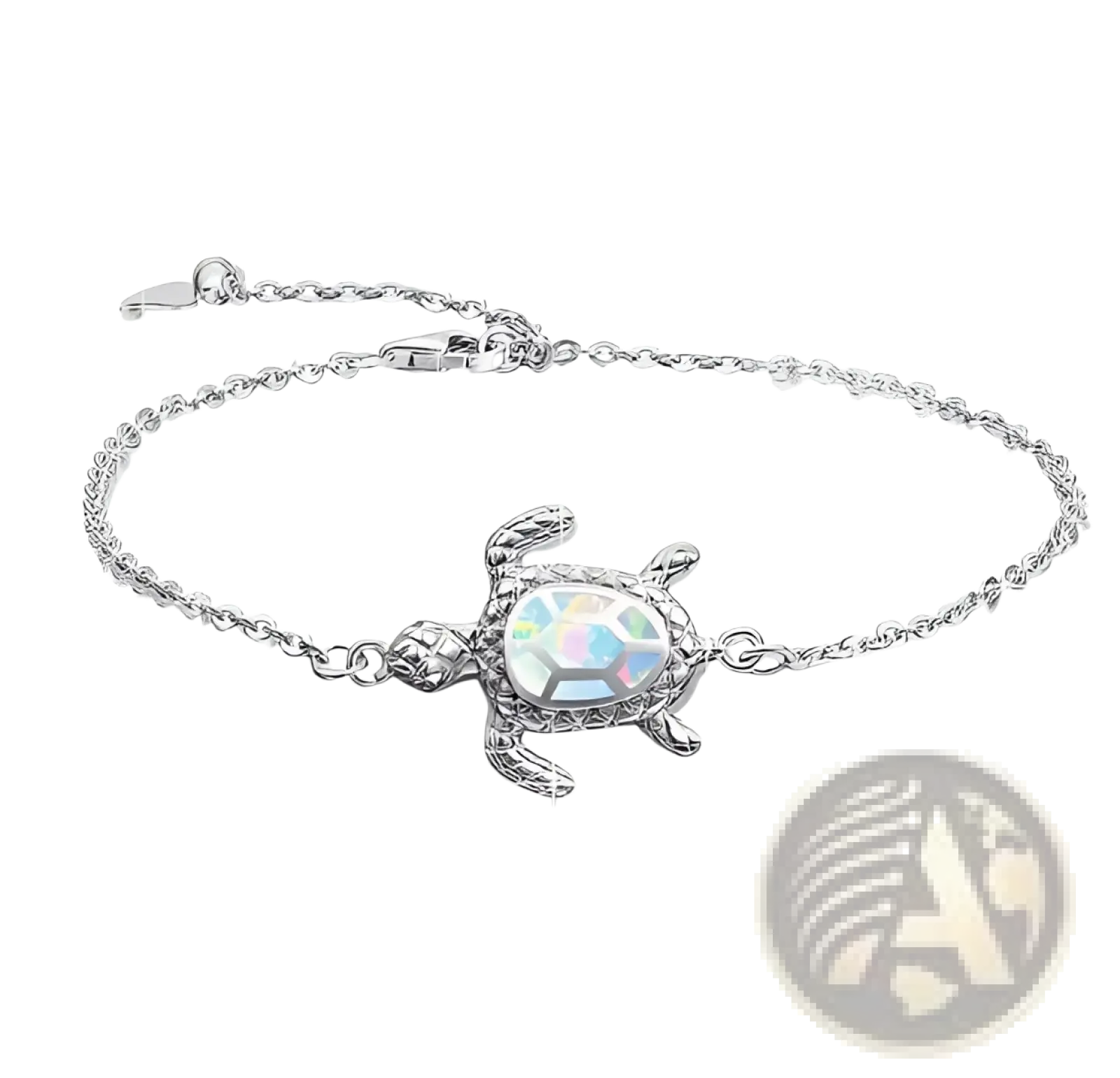 Silver sea turtle anklet featuring an iridescent opal inlay set in an ornate silver metal frame