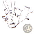 Silver teardrop bridal jewelry set 925 sterling featuring delicate chains, elegant swirl ring, and matching earrings