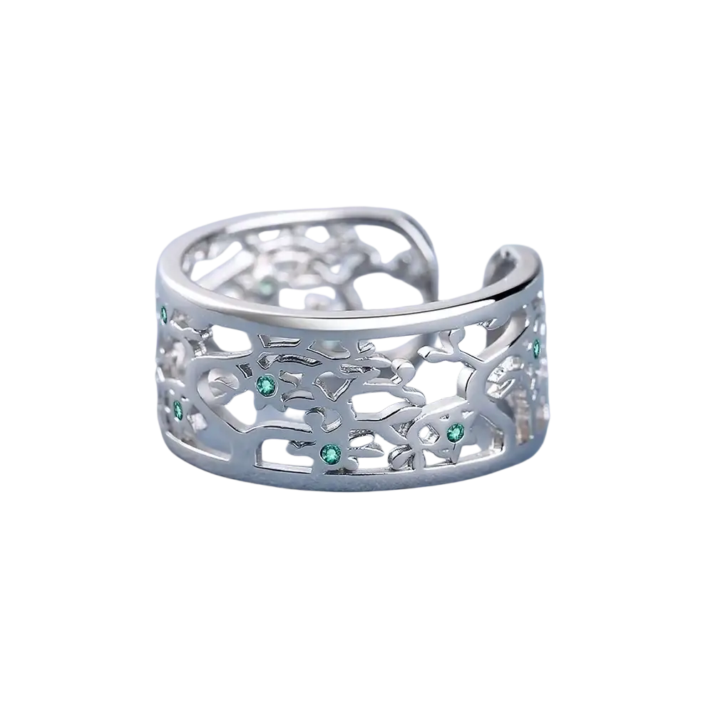 Silver tree of life open ring in sterling silver with intricate floral cutout design and green zircon gemstones