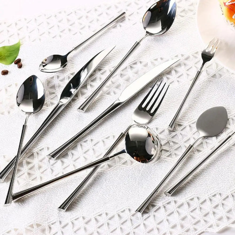 Polished silver western stainless steel cutlery set with shiny, sleek, modern design and reflective surfaces