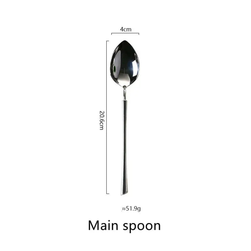 A sleek 20.6cm polished silver western stainless steel spoon with reflective finish and elongated handle