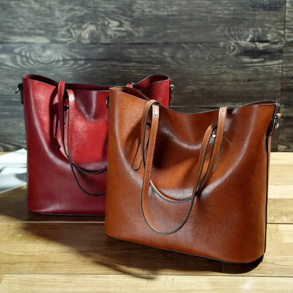 Vintage oil wax leather tote and shoulder bag in rich glossy red and warm brown with sturdy handles